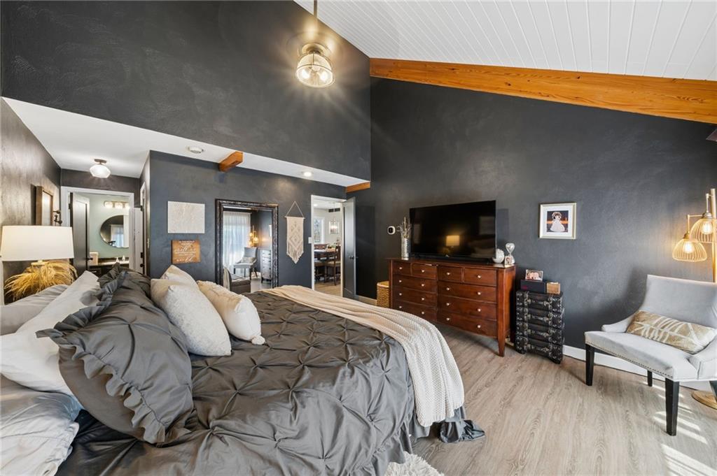 2187 Elizabeth Court Export, PA 15632 - Photo 18 of 43 a bedroom with a bed and a flat screen tv