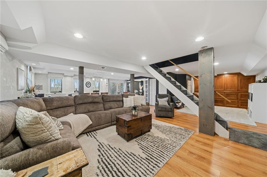 2187 Elizabeth Court Export, PA 15632 - Photo 26 of 43 a living room with furniture and a wooden floor