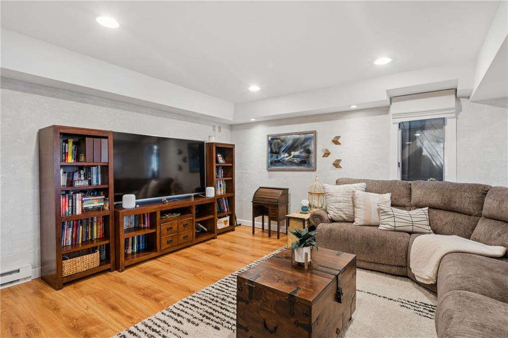 2187 Elizabeth Court Export, PA 15632 - Photo 27 of 43 a living room with furniture and a flat screen tv