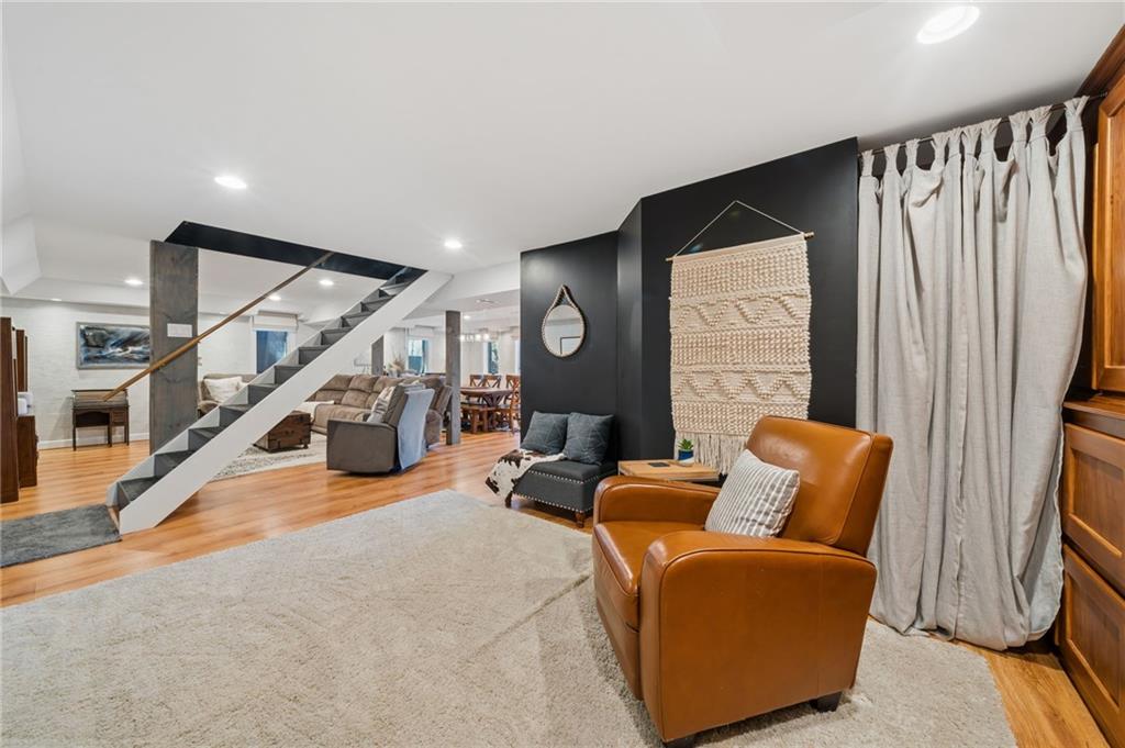 2187 Elizabeth Court Export, PA 15632 - Photo 30 of 43 a living room with furniture and a flat screen tv