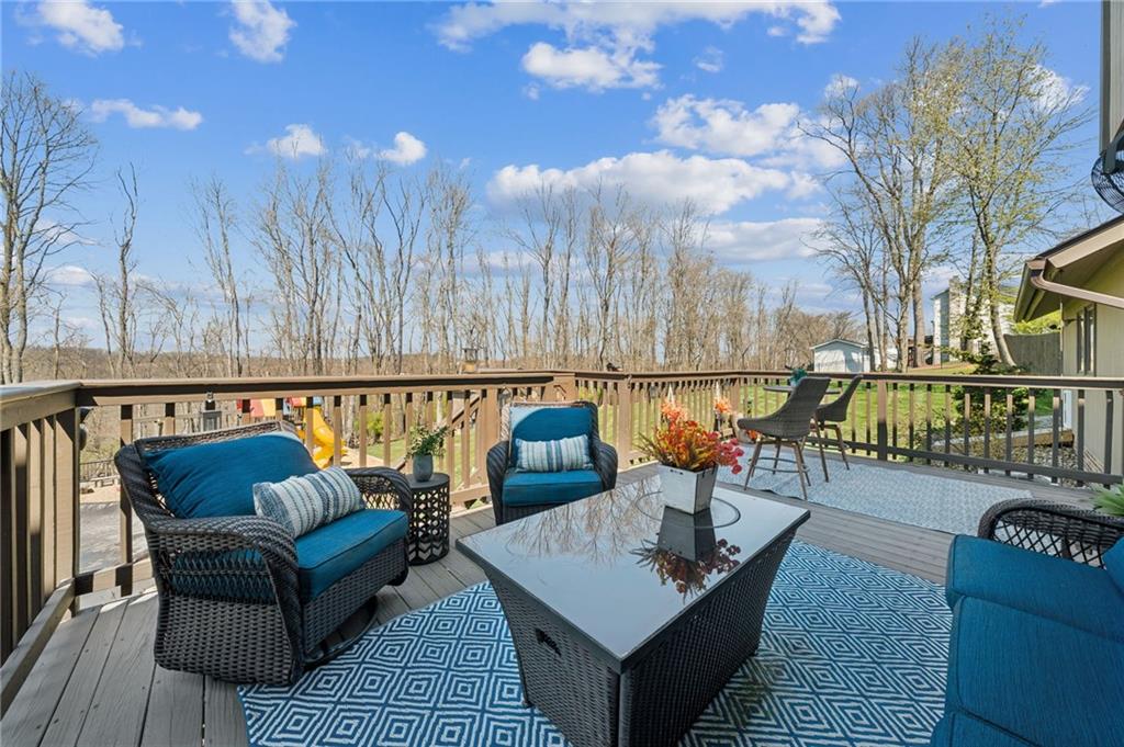 2187 Elizabeth Court Export, PA 15632 - Photo 35 of 43 a balcony with wooden floor and outdoor seating