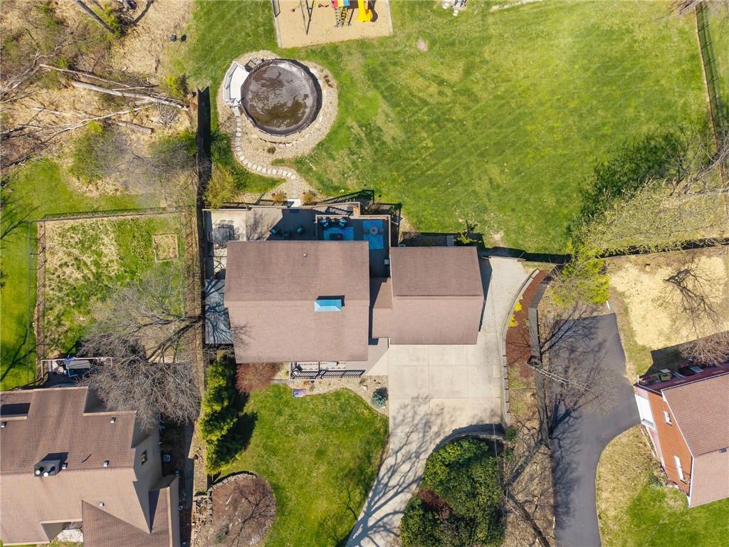 2187 Elizabeth Court Export, PA 15632 - Photo 42 of 43 an aerial view of a house with garden space and a lake view