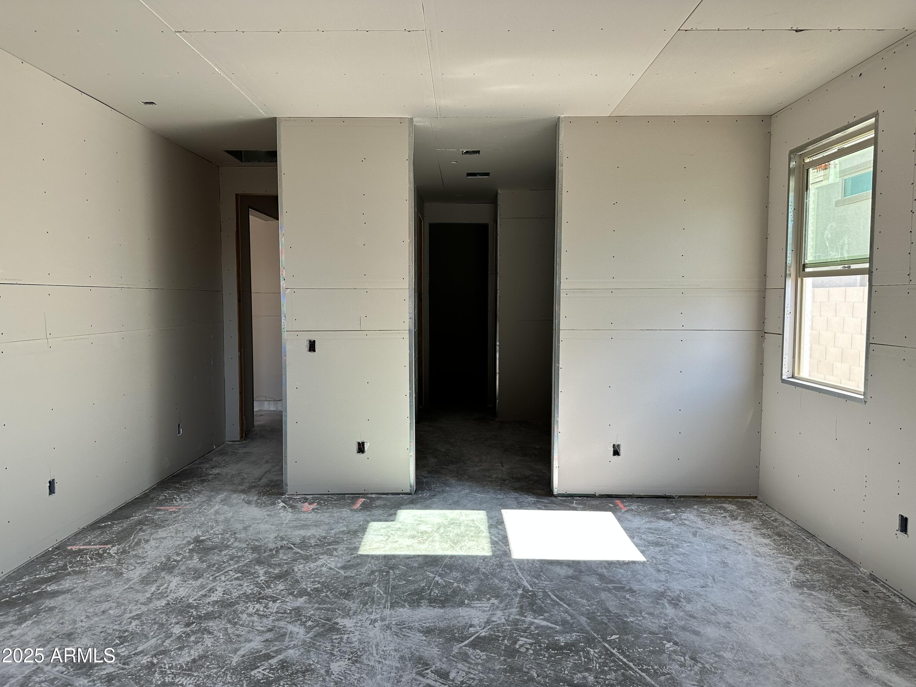 5532 West Hopi Trail Laveen, AZ 85339 - Photo 11 of 26 an empty room with window