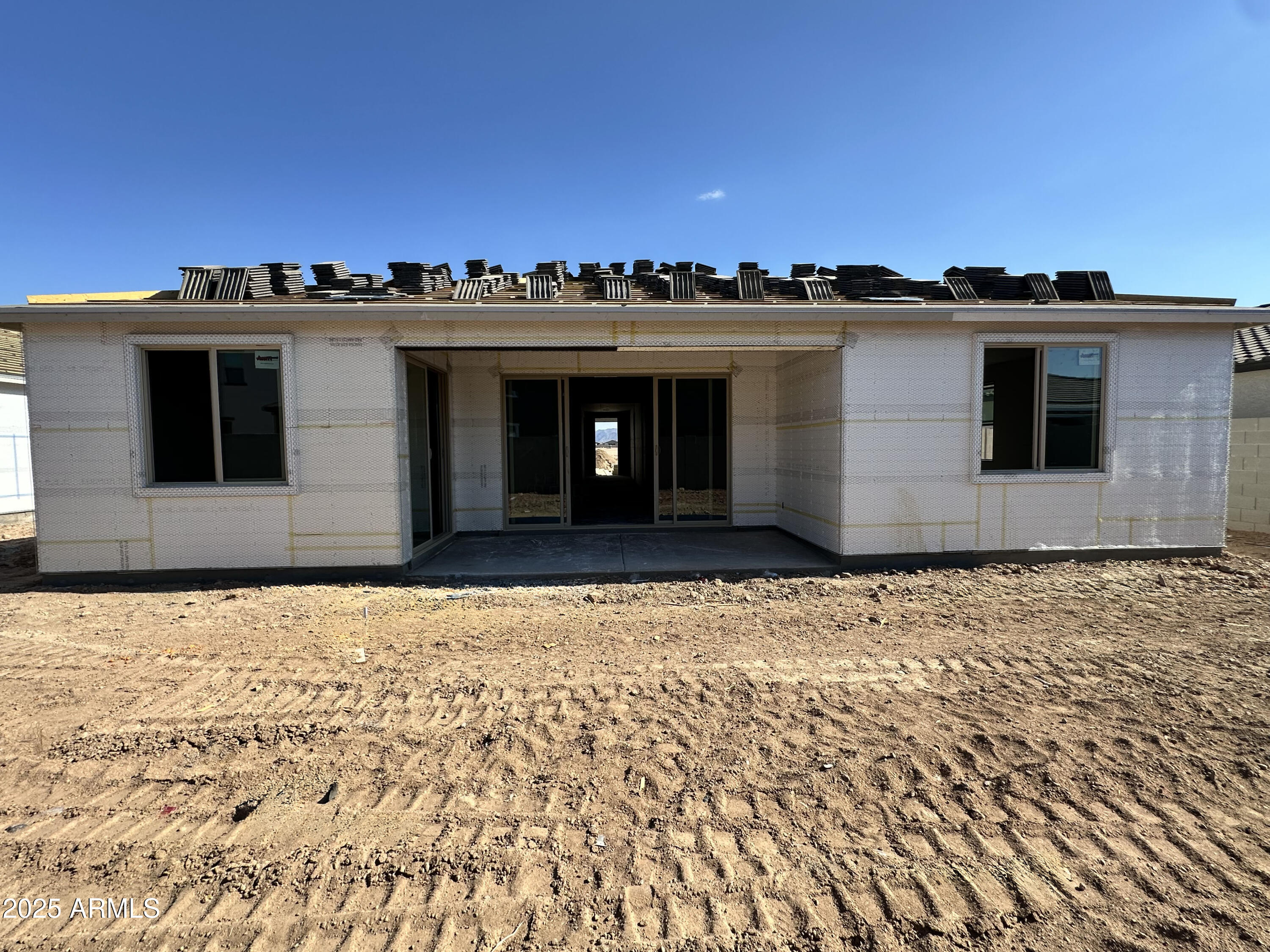 5532 West Hopi Trail Laveen, AZ 85339 - Photo 12 of 26 a view of a house with a yard