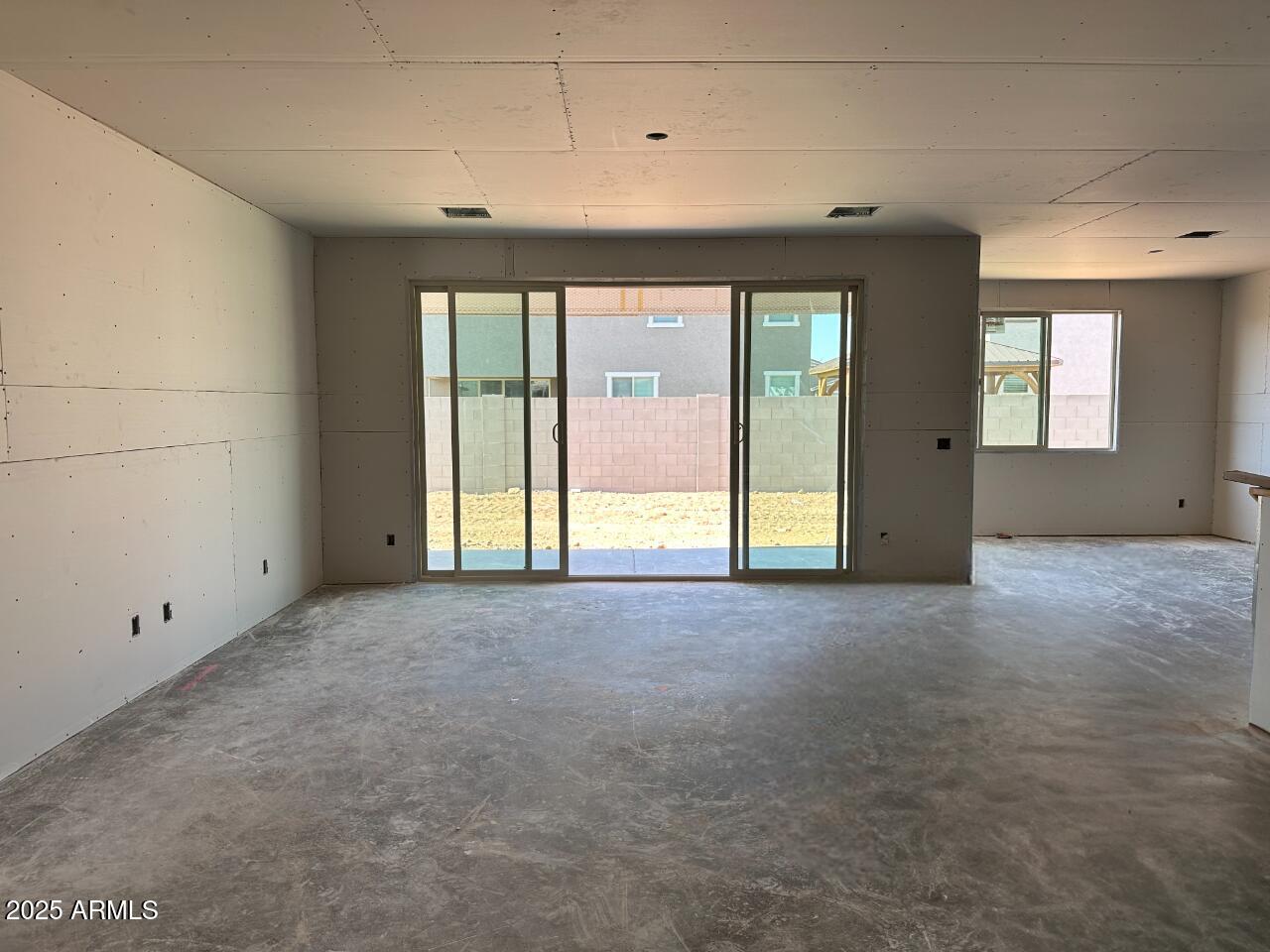 5532 West Hopi Trail Laveen, AZ 85339 - Photo 4 of 26 a view of an empty room with a window