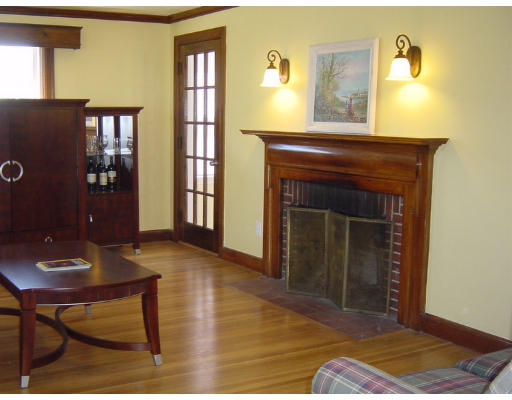 4 Douglas Road Belmont, MA 02478 - Photo 2 of 9 a living room with furniture and a fireplace