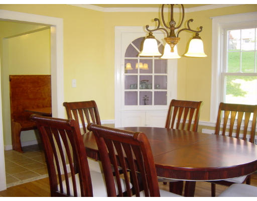 4 Douglas Road Belmont, MA 02478 - Photo 3 of 9 a view of a dining room with furniture and wooden floor