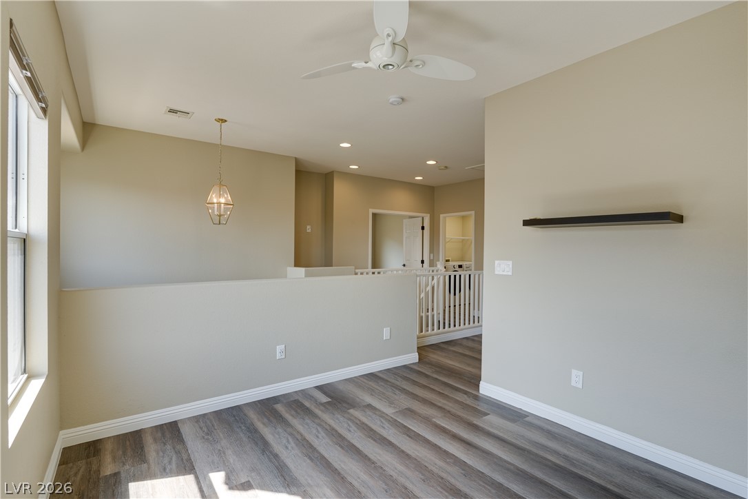 703 Principle Point Avenue Henderson, NV 89012 - Photo 15 of 29 Natural light illuminates this versatile loft space with durable flooring and modern fixtures.