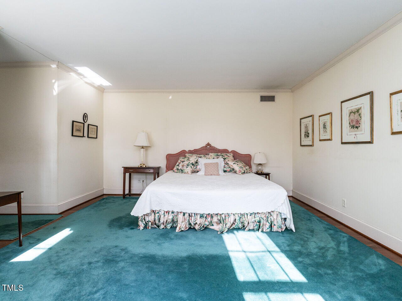 1016 Marlowe Road Raleigh, NC 27609 - Photo 20 of 33 a bedroom with a bed and a window