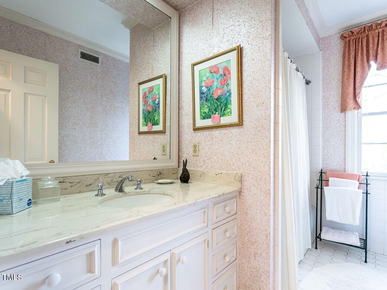 1016 Marlowe Road Raleigh, NC 27609 - Photo 26 of 33 a bathroom with a granite countertop sink mirror and a window