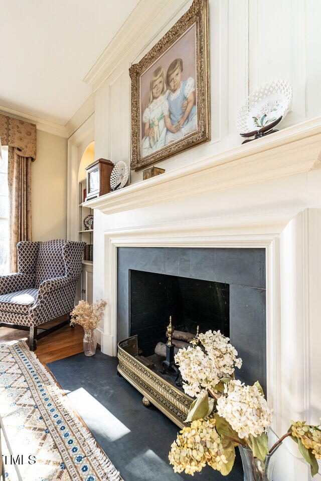 1016 Marlowe Road Raleigh, NC 27609 - Photo 8 of 33 a living room with furniture and a fireplace
