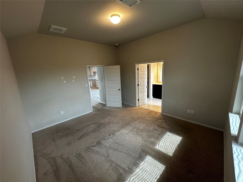 316 Insider Loop Elgin, TX 78621 - Photo 7 of 13 a view of an empty room and window