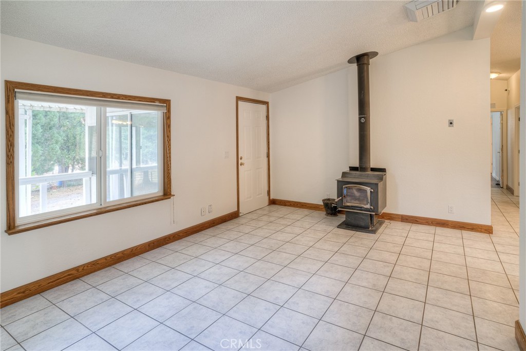 3635 Charqui Court Oroville, CA 95965 - Photo 11 of 75 a view of an empty room with windows