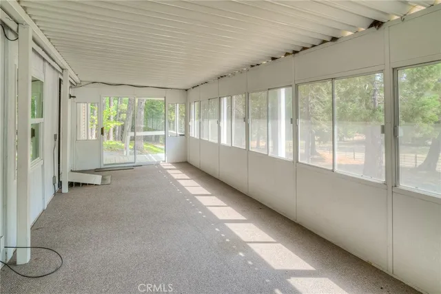 a view of an empty room and window