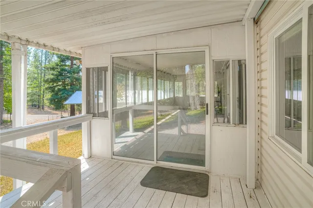 a kitchen with granite countertop cabinets stainless steel appliances and a window
