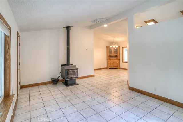 a kitchen with stainless steel appliances granite countertop a refrigerator and a stove