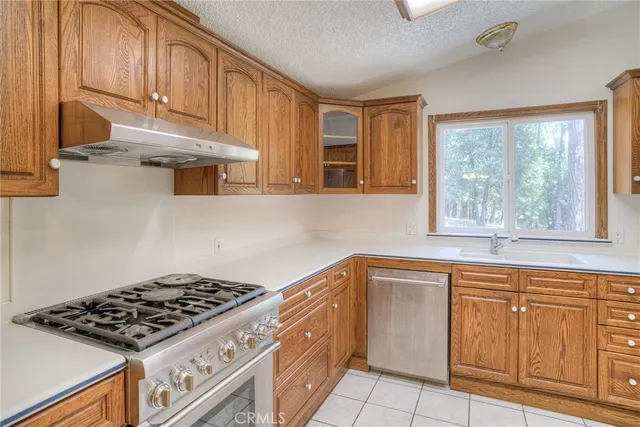 a bathroom with a toilet sink vanity shower and bathtub