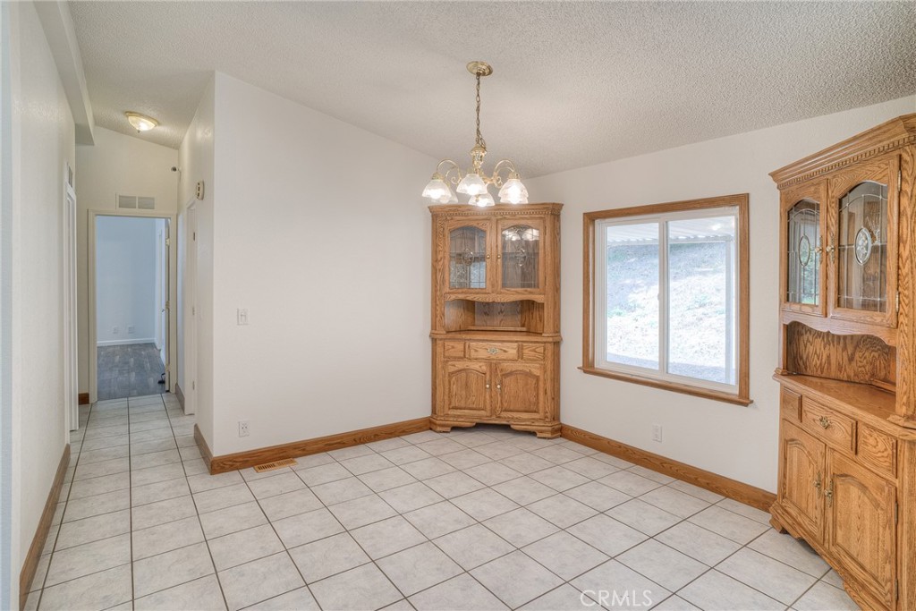 3635 Charqui Court Oroville, CA 95965 - Photo 24 of 75 a view of a room with window and hardwood floor