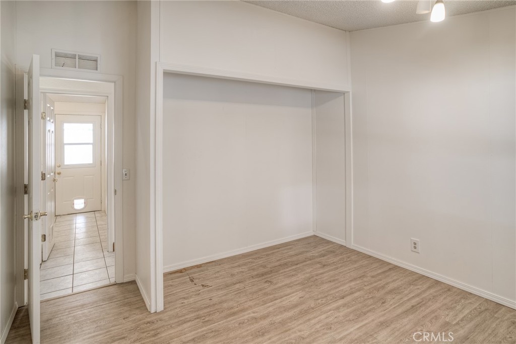 3635 Charqui Court Oroville, CA 95965 - Photo 27 of 75 a view of empty room with wooden floor