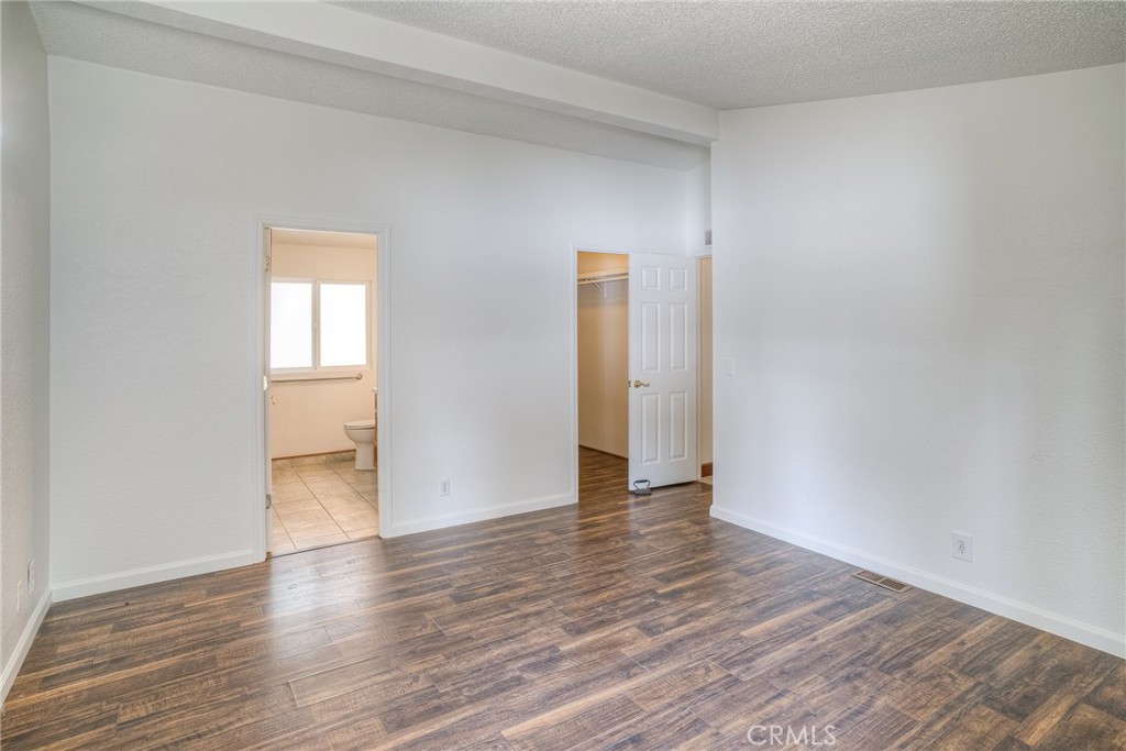 3635 Charqui Court Oroville, CA 95965 - Photo 30 of 75 a view of an empty room and wooden floor