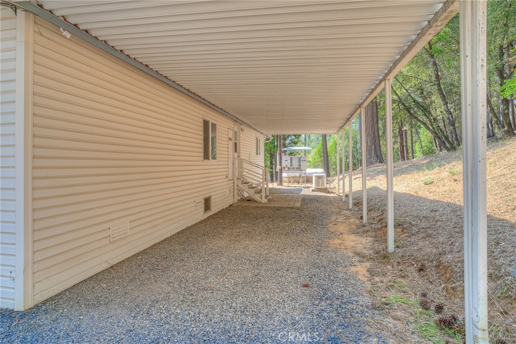 3635 Charqui Court Oroville, CA 95965 - Photo 37 of 75 a view of a house with backyard and floor to ceiling window