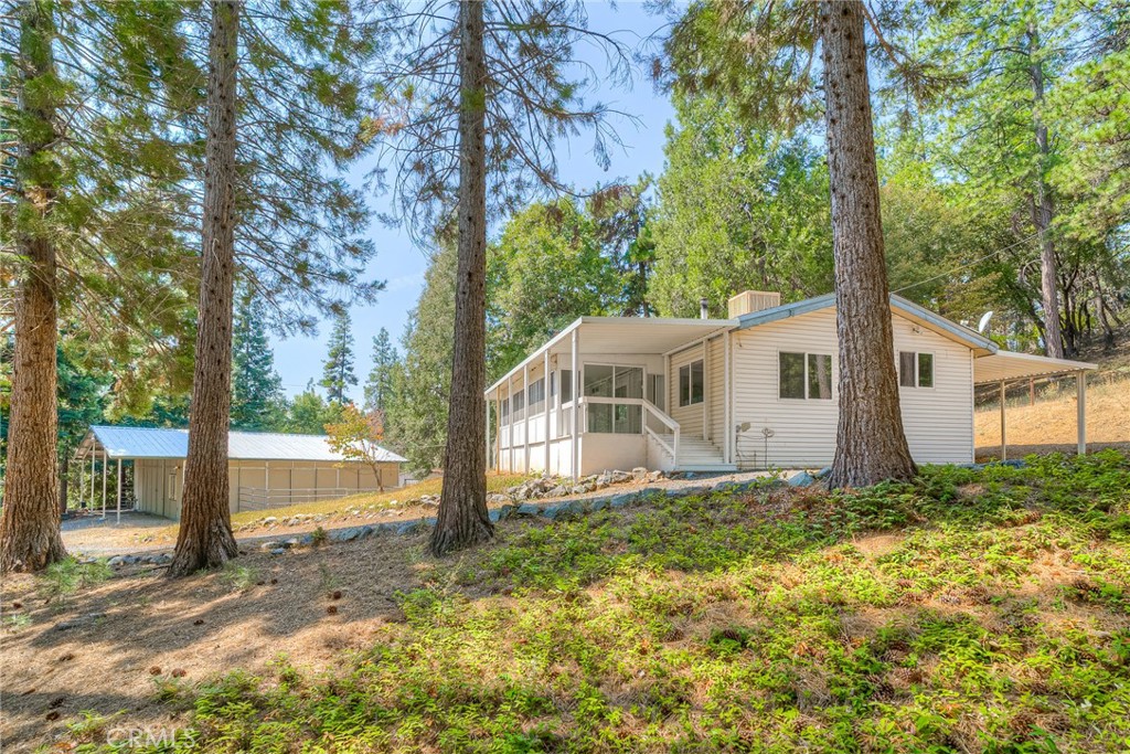 3635 Charqui Court Oroville, CA 95965 - Photo 5 of 75 a front view of a house with a yard