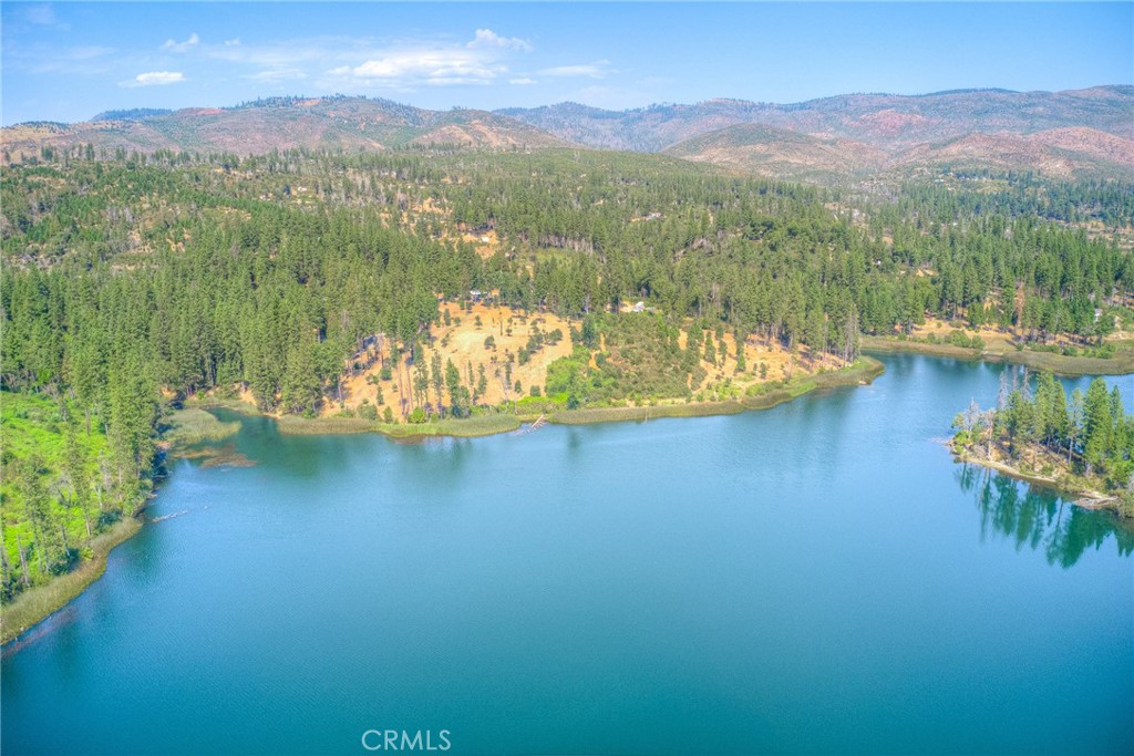 3635 Charqui Court Oroville, CA 95965 - Photo 7 of 75 a view of a lake with a mountain