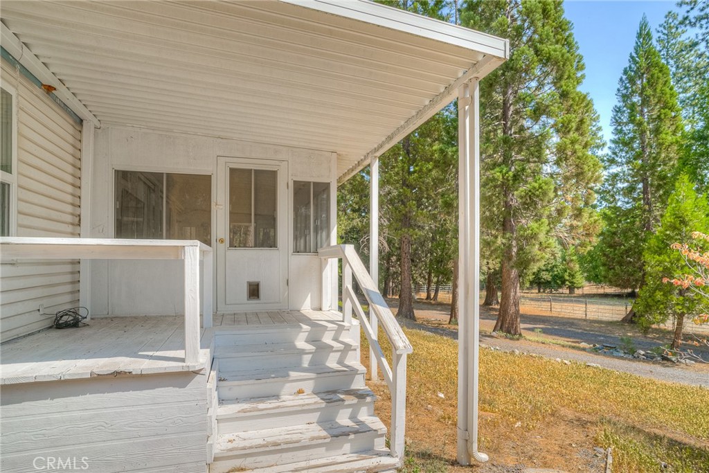 3635 Charqui Court Oroville, CA 95965 - Photo 9 of 75 a front view of a house with a garden