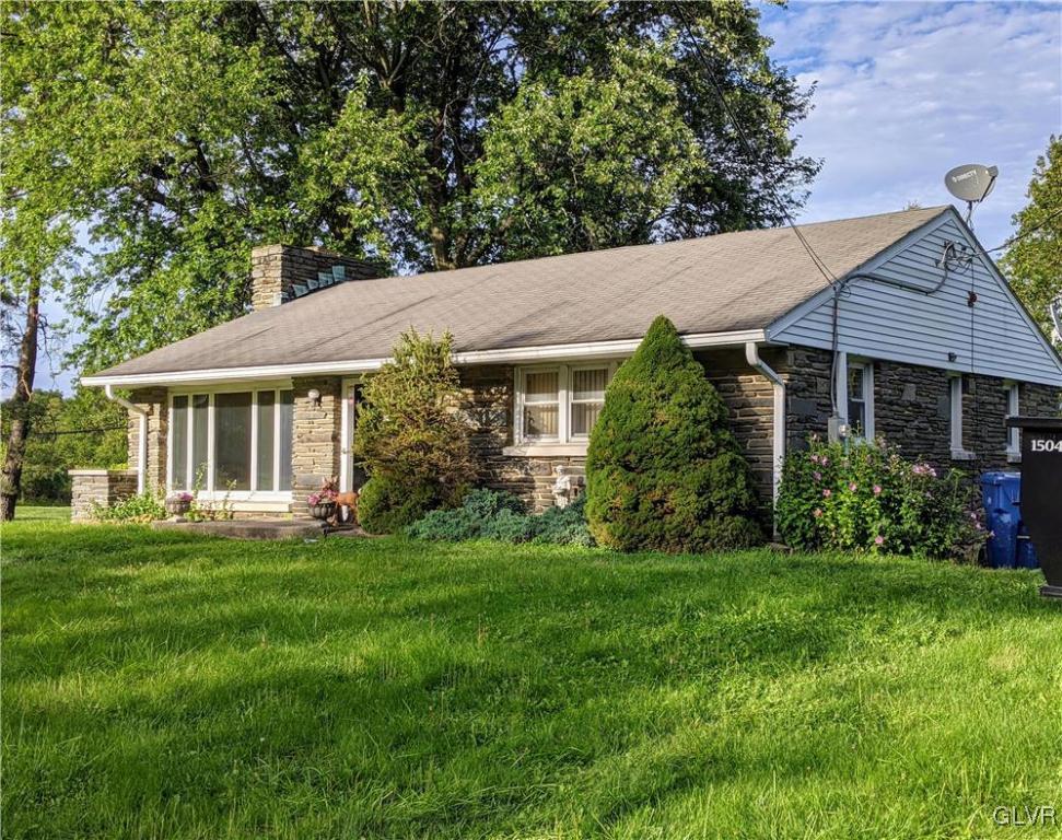 2045 Blue Barn Road Orefield, PA 18069 - Photo 3 of 28 a view of a house with a yard plants and large trees