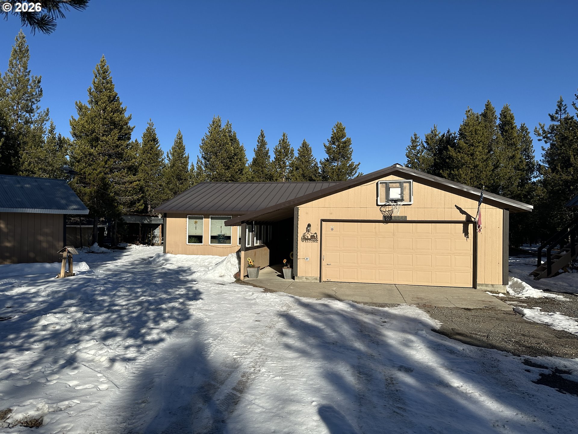 a house with trees in the background