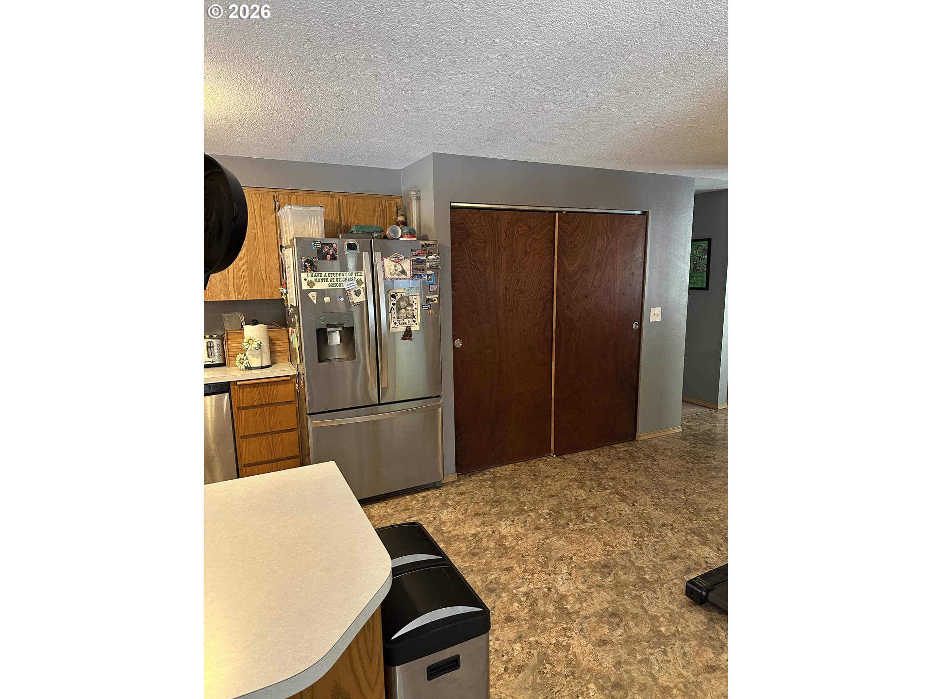 123977 Surveyor Road Crescent Lake, OR 97733 - Photo 19 of 46 a kitchen with stainless steel appliances a refrigerator and microwave
