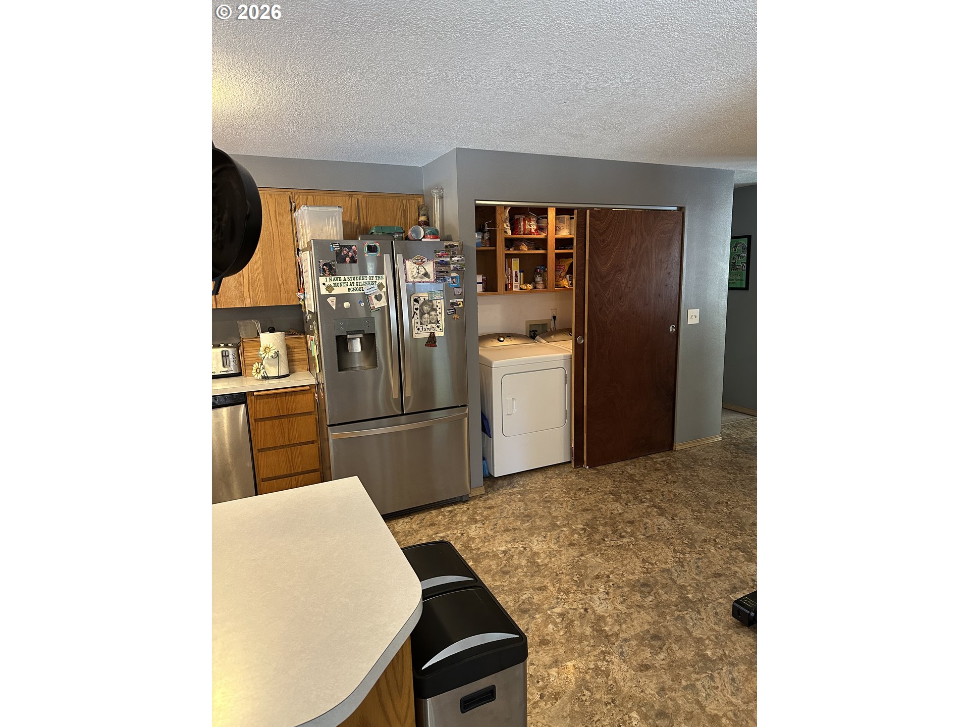 123977 Surveyor Road Crescent Lake, OR 97733 - Photo 20 of 46 a kitchen with a refrigerator and microwave