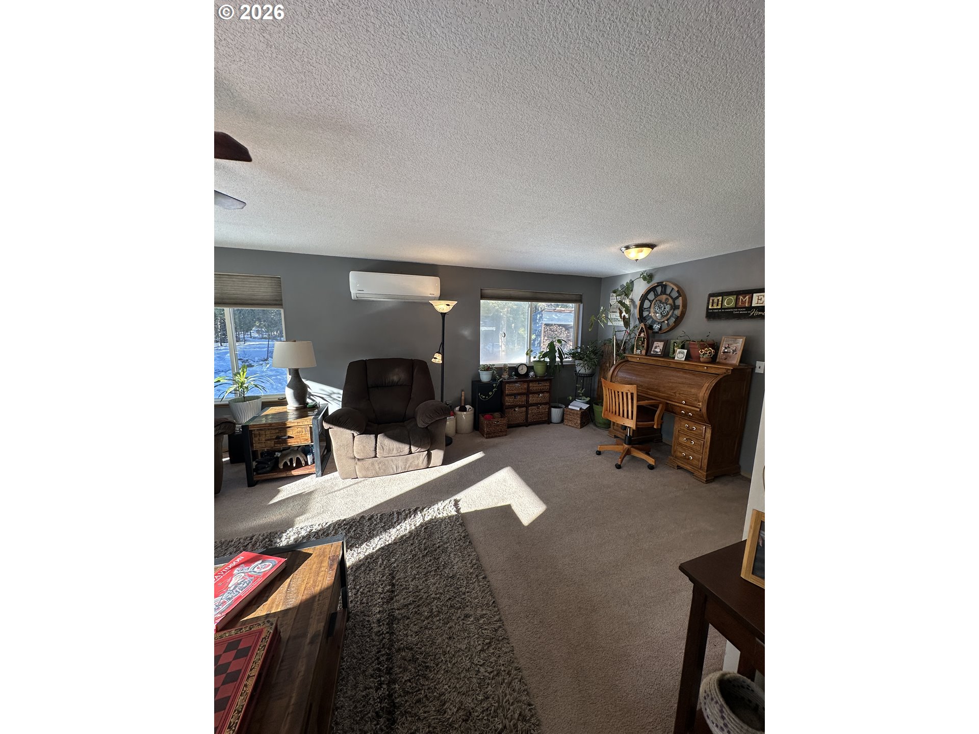 123977 Surveyor Road Crescent Lake, OR 97733 - Photo 22 of 46 a living room with furniture and a dining table