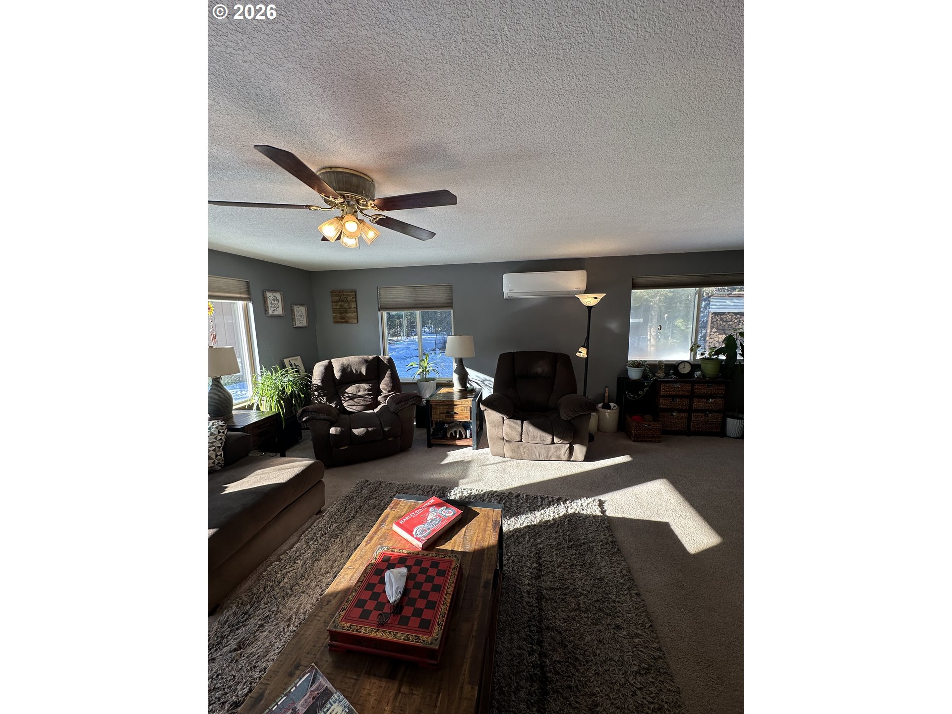 123977 Surveyor Road Crescent Lake, OR 97733 - Photo 23 of 46 a living room with furniture and a window