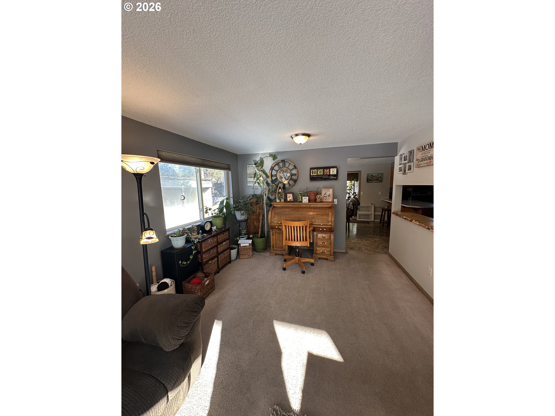 123977 Surveyor Road Crescent Lake, OR 97733 - Photo 25 of 46 a living room with furniture and a flat screen tv