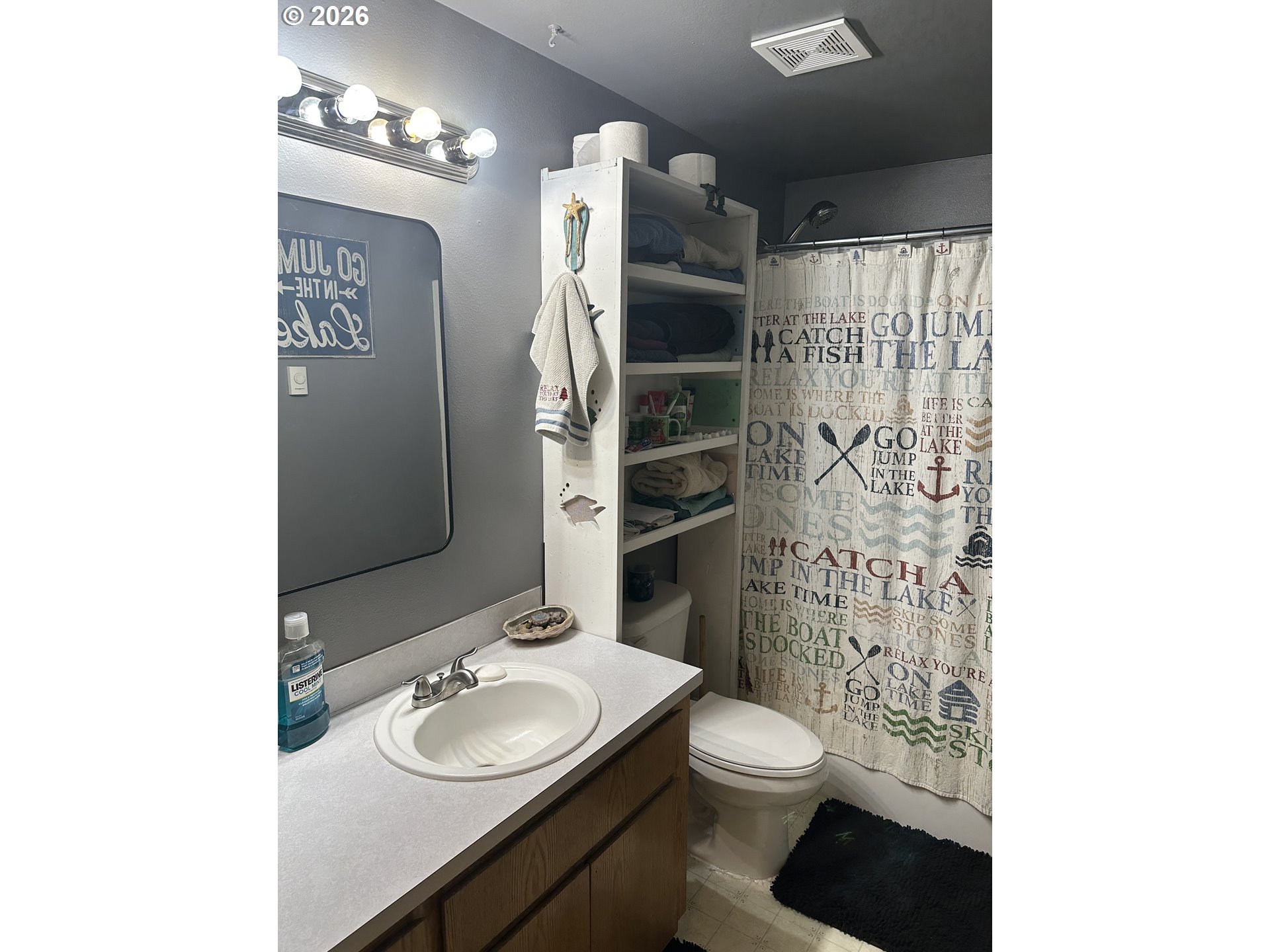123977 Surveyor Road Crescent Lake, OR 97733 - Photo 31 of 46 a bathroom with a granite countertop sink toilet and shower