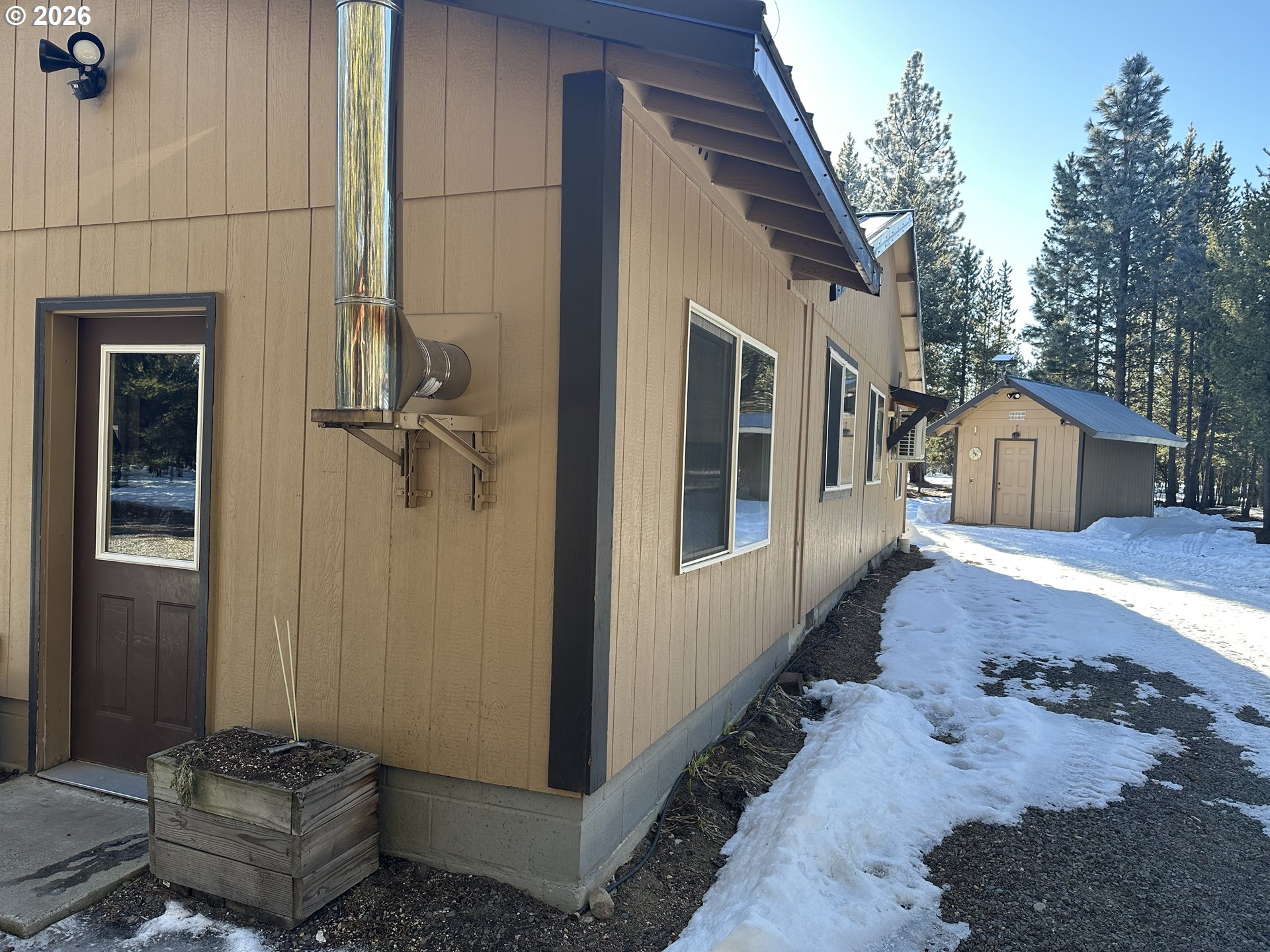 123977 Surveyor Road Crescent Lake, OR 97733 - Photo 5 of 46 a house view with a backyard space
