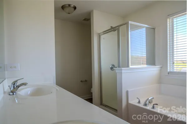 a bathroom with a sink and a bathtub