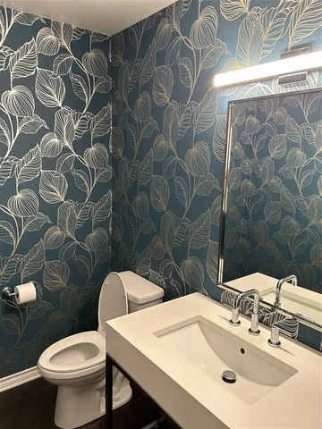 a bathroom with a sink and a toilet