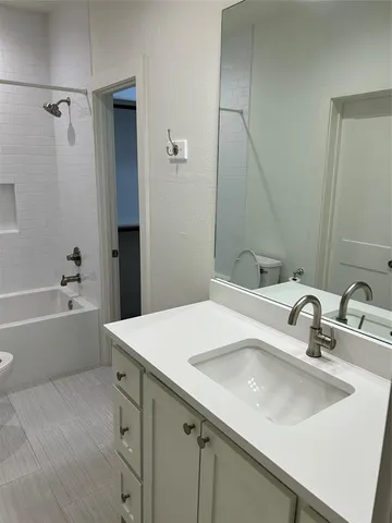 an empty room with a fireplace