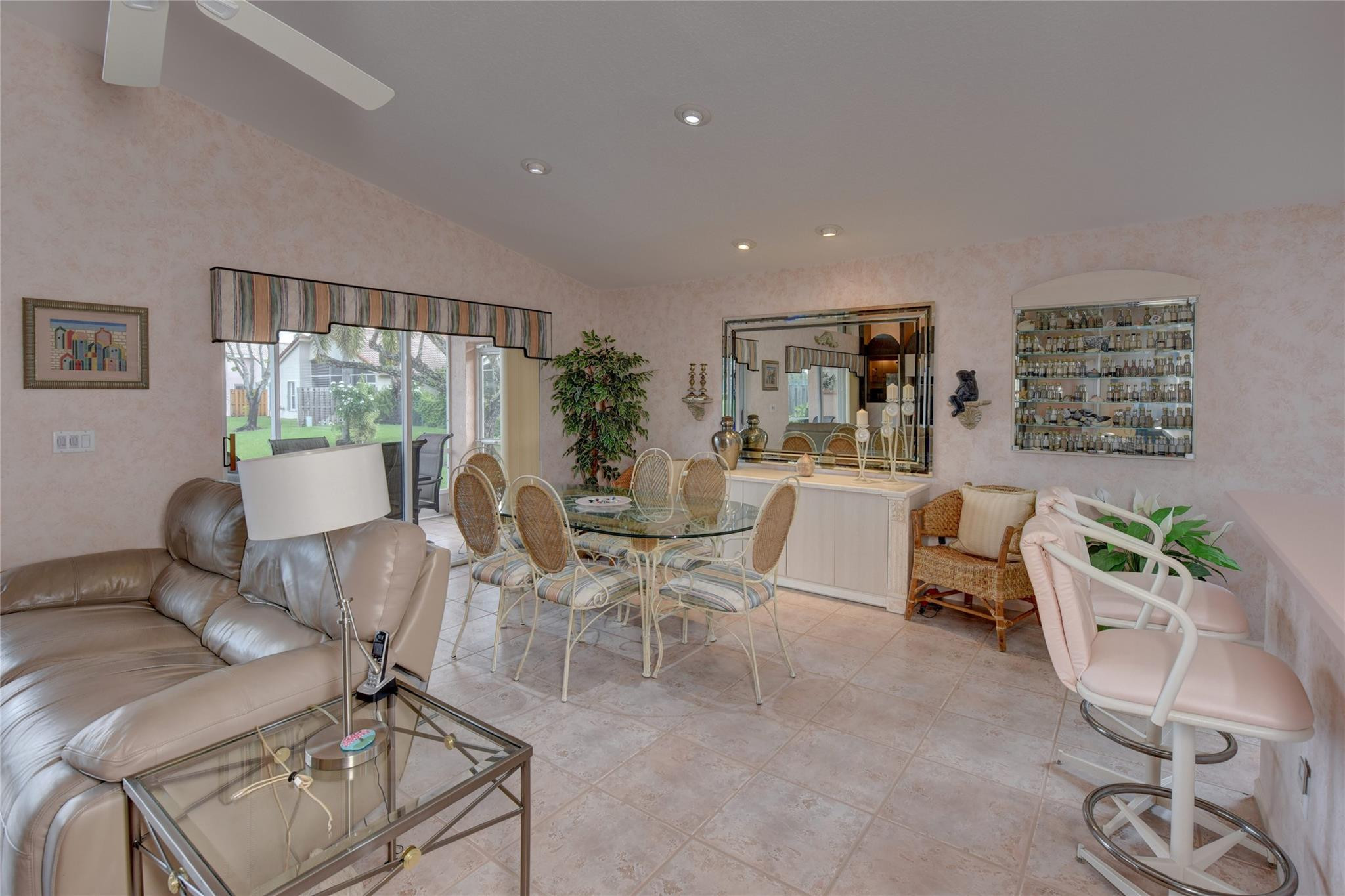 22918 Sterling Lakes Drive Boca Raton, FL 33433 - Photo 19 of 57 a living room with furniture and a large window