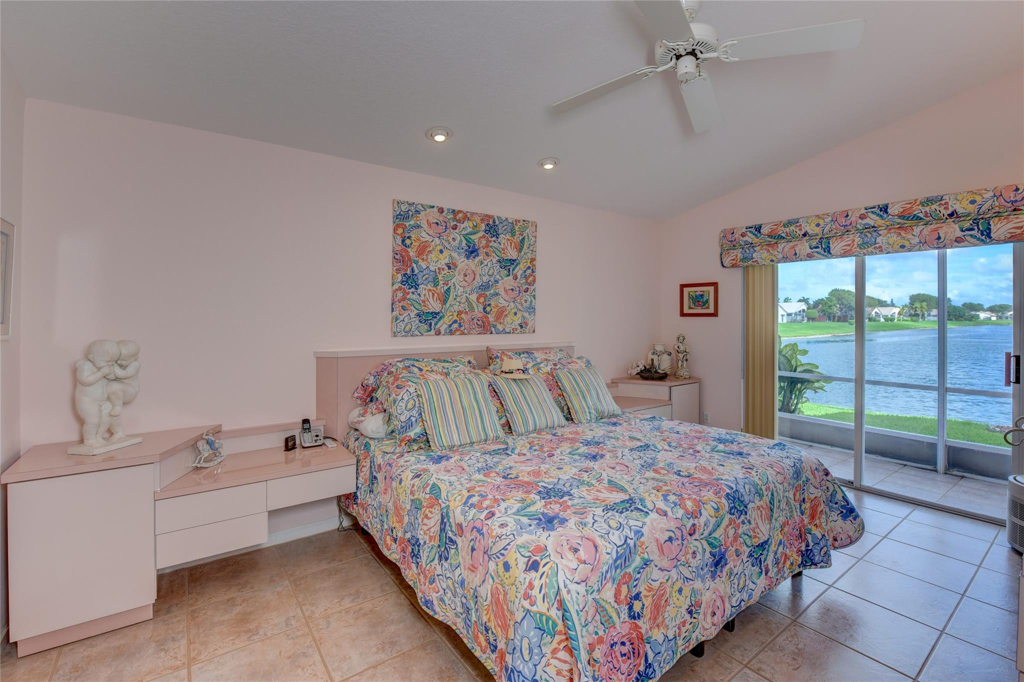 22918 Sterling Lakes Drive Boca Raton, FL 33433 - Photo 29 of 57 a bed room with a bed and a large window
