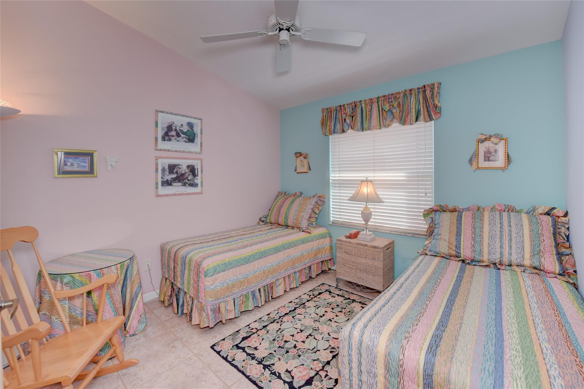 22918 Sterling Lakes Drive Boca Raton, FL 33433 - Photo 40 of 57 a bedroom with two beds and painting on the wall