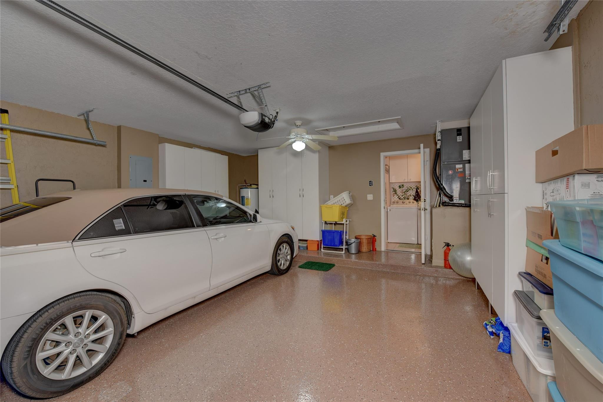 22918 Sterling Lakes Drive Boca Raton, FL 33433 - Photo 43 of 57 a view of car garage