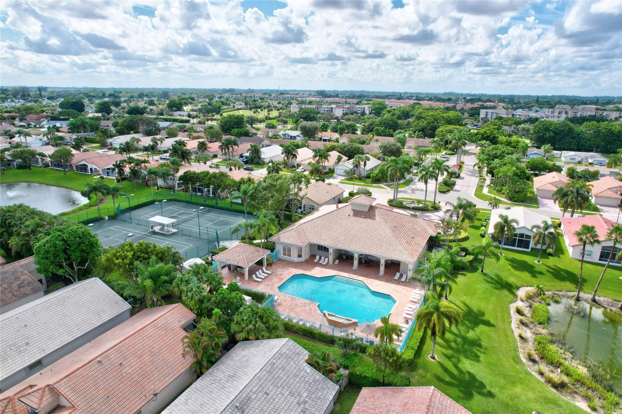 22918 Sterling Lakes Drive Boca Raton, FL 33433 - Photo 49 of 57 an aerial view of a house with a garden