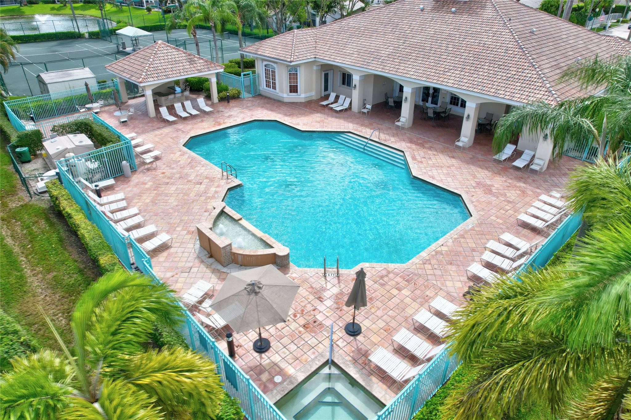 22918 Sterling Lakes Drive Boca Raton, FL 33433 - Photo 54 of 57 an aerial view of a house with swimming pool garden and patio