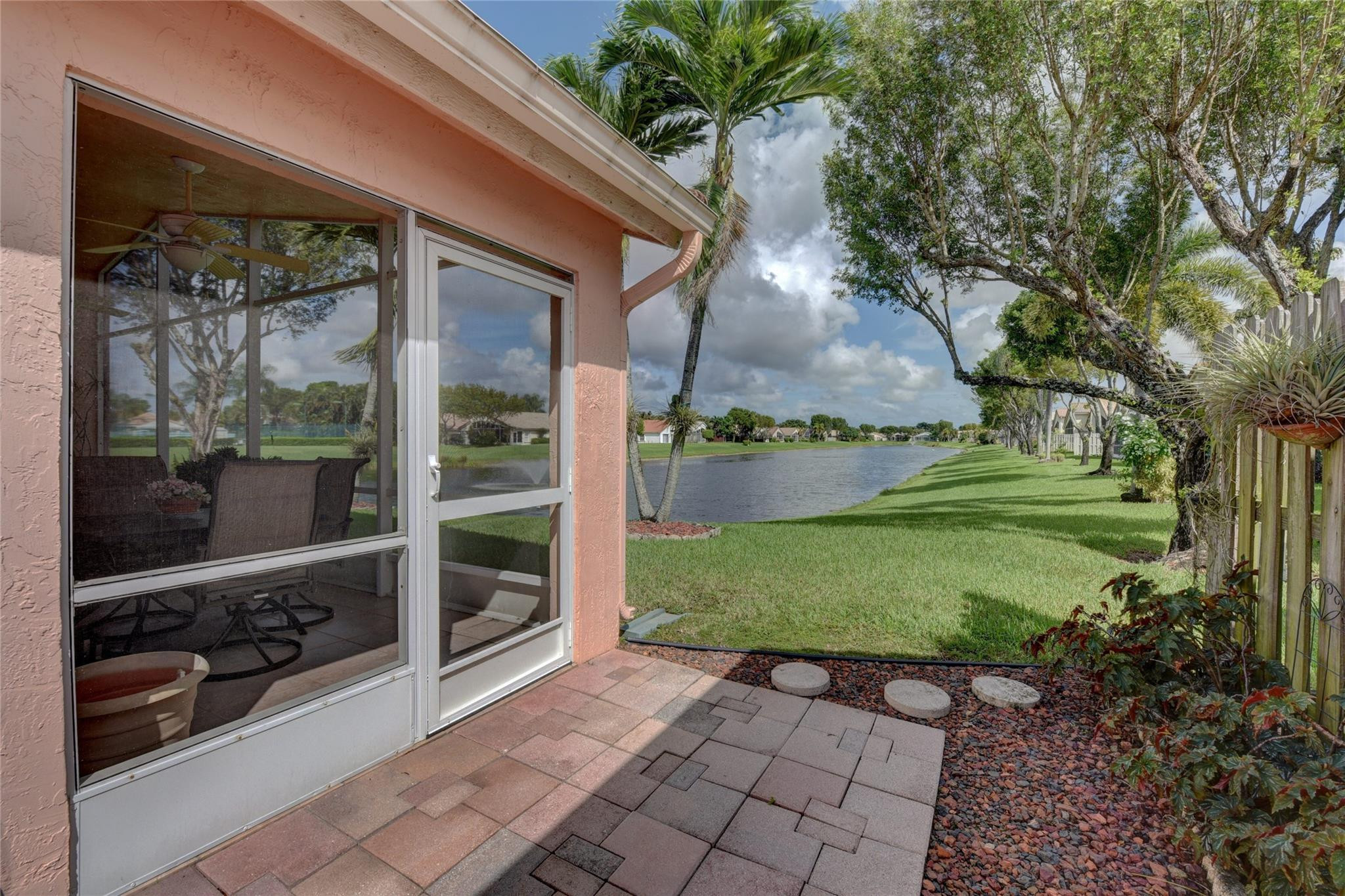 22918 Sterling Lakes Drive Boca Raton, FL 33433 - Photo 8 of 57 a view of a back yard of the house and a yard