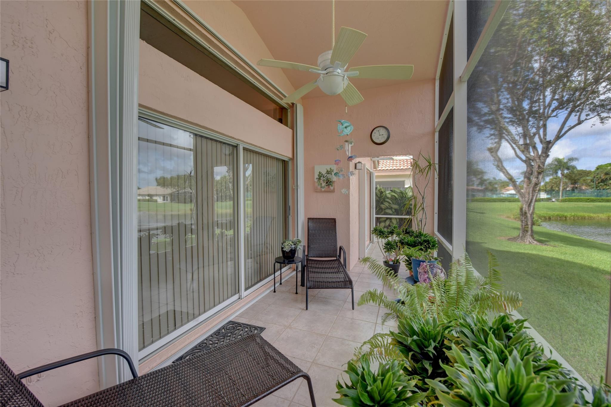 22918 Sterling Lakes Drive Boca Raton, FL 33433 - Photo 9 of 57 a lobby with furniture and garden