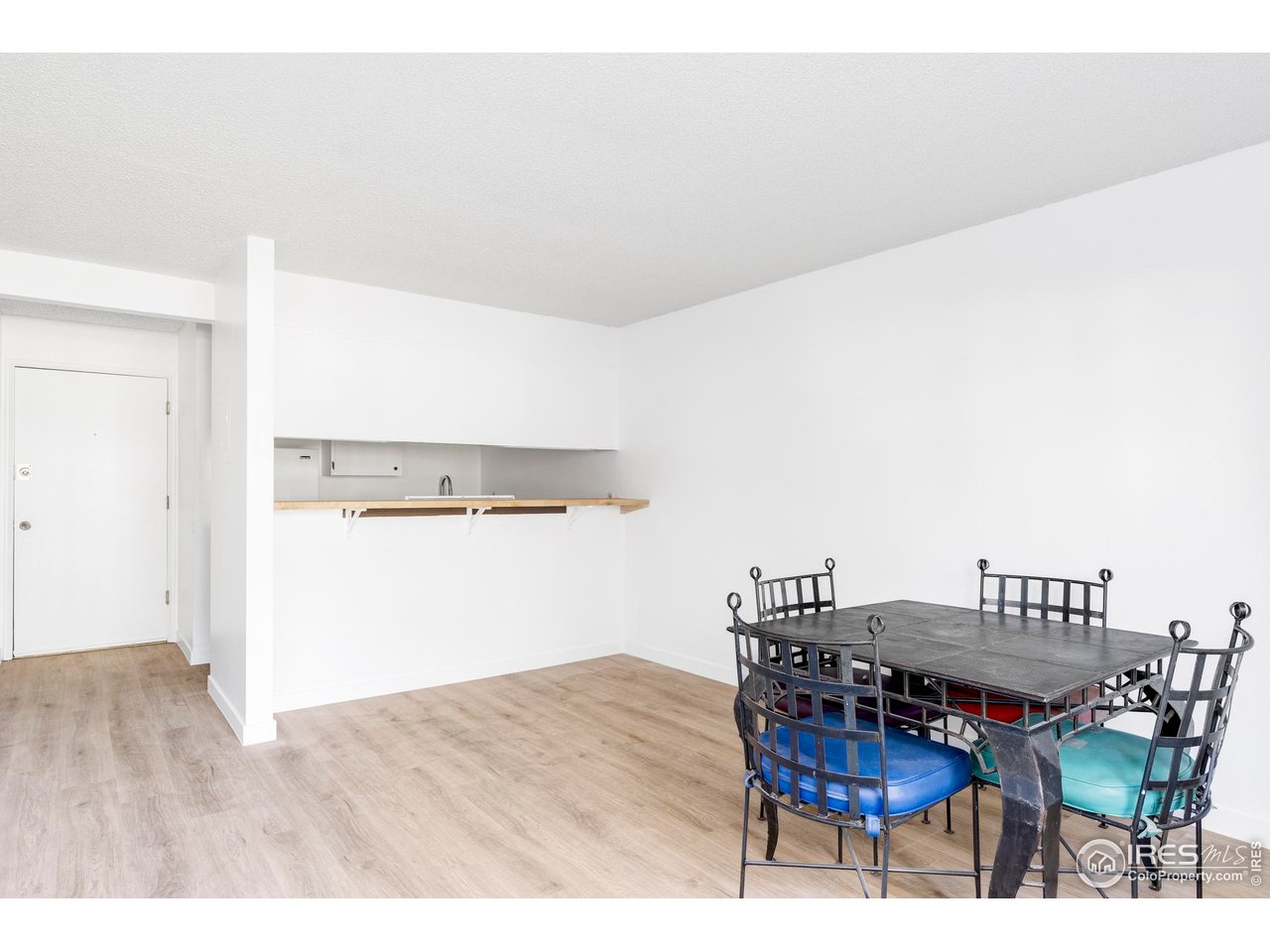 2707 Valmont Road, Unit 205D Boulder, CO 80304 - Photo 5 of 18 a workspace with furniture and wooden floor