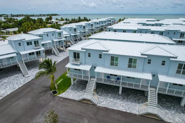 a view of a chairs and table in the patio